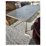 outdoor rectangular glass-top patio dining table