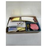 Sticky notes, note pads and more assorted in flat