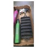 Subzero water bottles ,wooden cow decoration, and