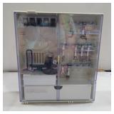 Bernina accessory box with 14 feet, bobbins, and