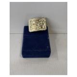 silver plated Western belt buckle with blue