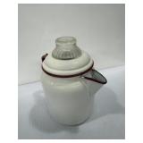 white and red enamelware percolator coffee pot