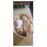 Moses basket with 2 baby dolls