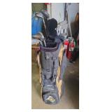 Purdue golf bag with assorted clubs and McGregor