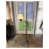 Vintage black wrought iron floor lamp with swing