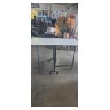 Folding drop leaf sewing/crafting table on wheels