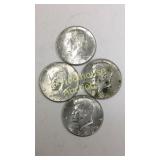 3 1969 and 1 1965 Eisenhower Half Dollars