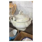 White soup tureen with spoon