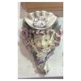 1 wall pocket and 1 fairy figurine