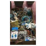 Flat full of bracelets, earring, and other jewelry