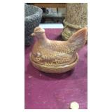 Glass hen on nest