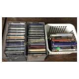 3 small containers of cds and dvds
