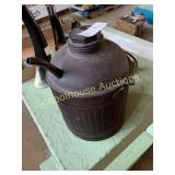 Oil can with rubbed sides