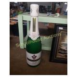 Large martini & rossi sparkling wine bottle.