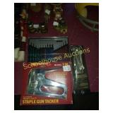 Group of tools. Wrenches, staple gun, and