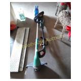 Two electric weedeaters