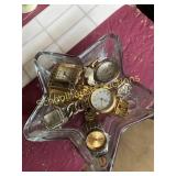 Glass star with 5 watches