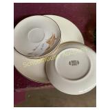 Golden wheat saucers and plates some wear with