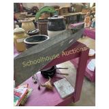 Metal boat with old non working boat for a pond