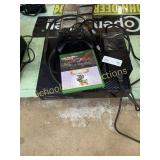 Xbox One with controller and game discs