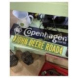 John Deere sign and pitcher with Copenhagen sign