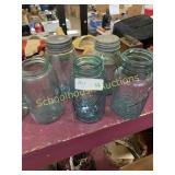 5 mason and ball jars blue glass