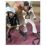 Two Scar Face Figures with articulating hands