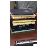Large stack of yearbooks