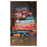 Stack of Wilton cake forms/decorating kits in