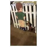 Wood fence with boy and dog