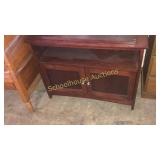 Storage cabinet. There is a shelf for inside