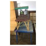 Table stack. Top is wicker with metal legs.