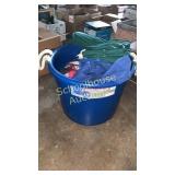 large blue bucket of appliance covers and other