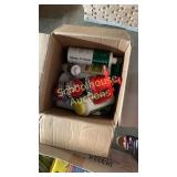 small box of chemical bottles for outdoor use