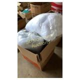large bags of white polyester fiber filling