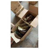 boxes of clay dishes and cups