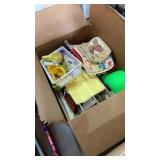 box of kitchenware, heat pads, and other random