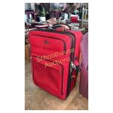 red ricardo suitcase