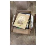 old pictures & box of christmas ornaments