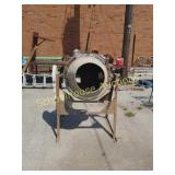 Working electric cement mixer. We saw it running.