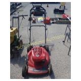 Red Toro mower. Does work. Heard it run