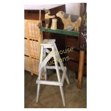 Wood windmill about 4 ft tall. Missing a few