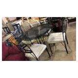 Black glass table & 4 metal chairs with cushions