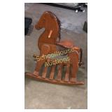 Wood rocking horse. head is loose needs love