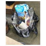 Diaper bag full of baby goodies