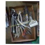 Flat of clamps, wrenches, vice grips.