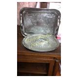 Silver colored serving platters. Platter is