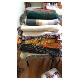 Stack of blankets. 8 crotchet, 3 others