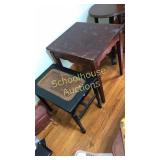 2 tables. Black with cane middle, brown with