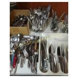 All the individual flatware & tray